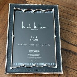 Nicole Miller Elegant Silver and Black Frame